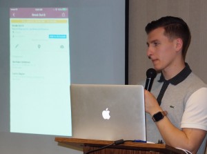 Staff providing Mobile ap training      