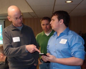 Staff traning client on how to download moble ap      
